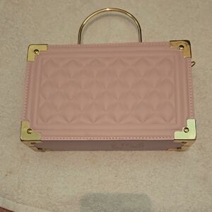 Elegant Pink Handbag with Gold Accents